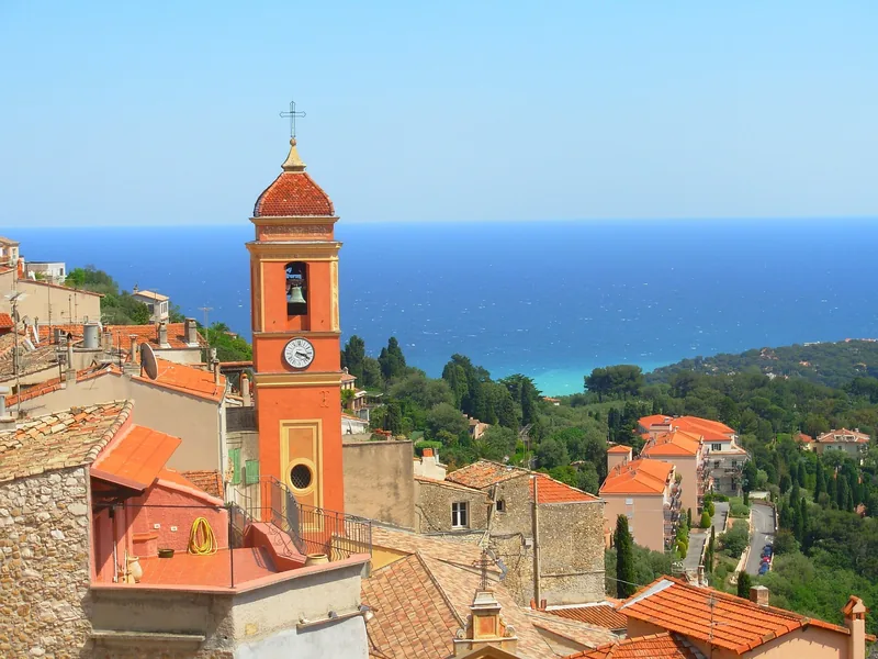 The bell tower of Roquebrune above the sea