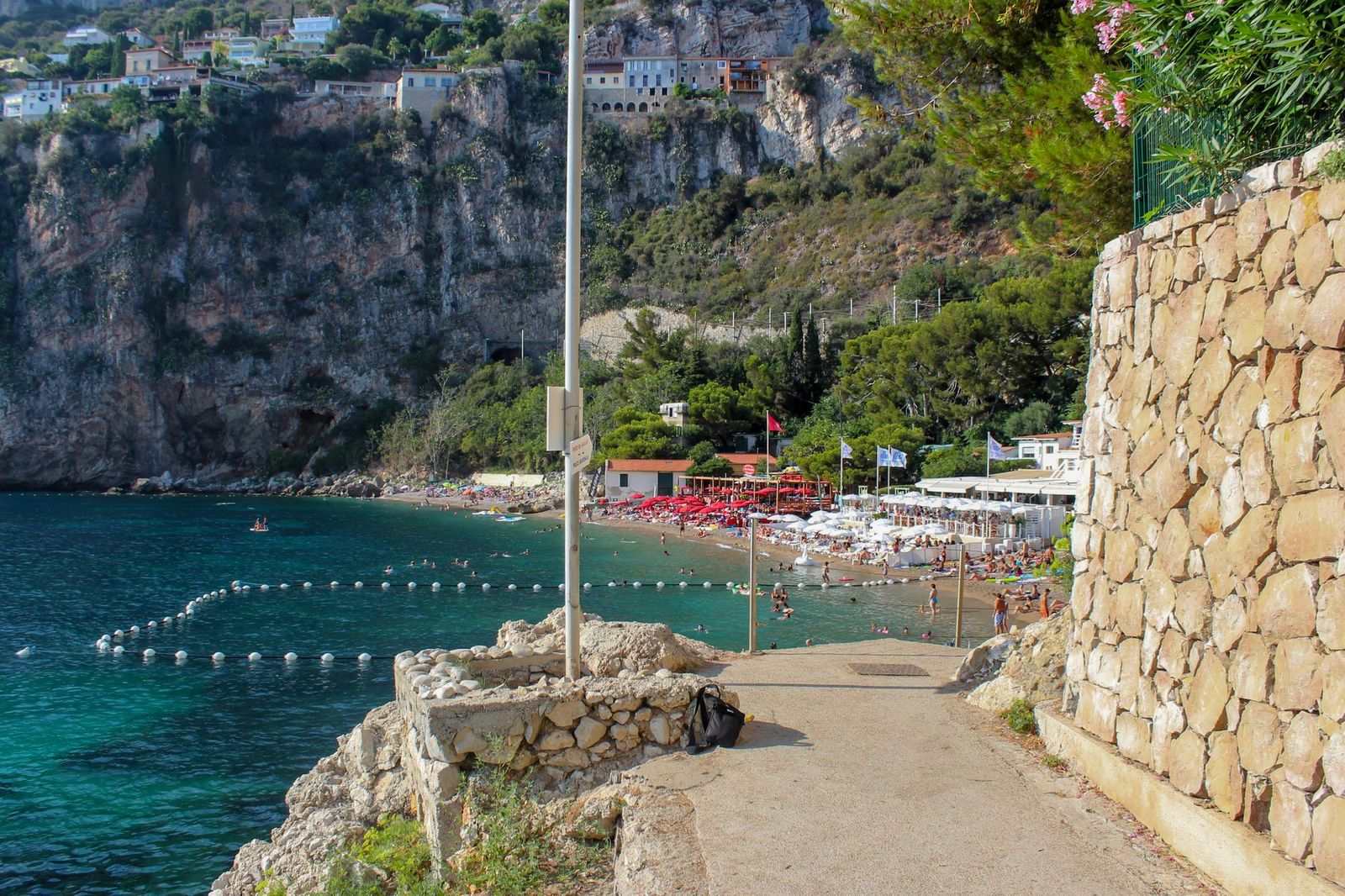 The cove at Plage Mala, Cap d'Ail, with the beach below the rocks