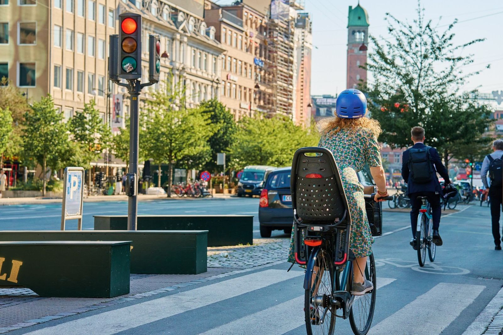 People cycling in a bike lane in central Copenhagen