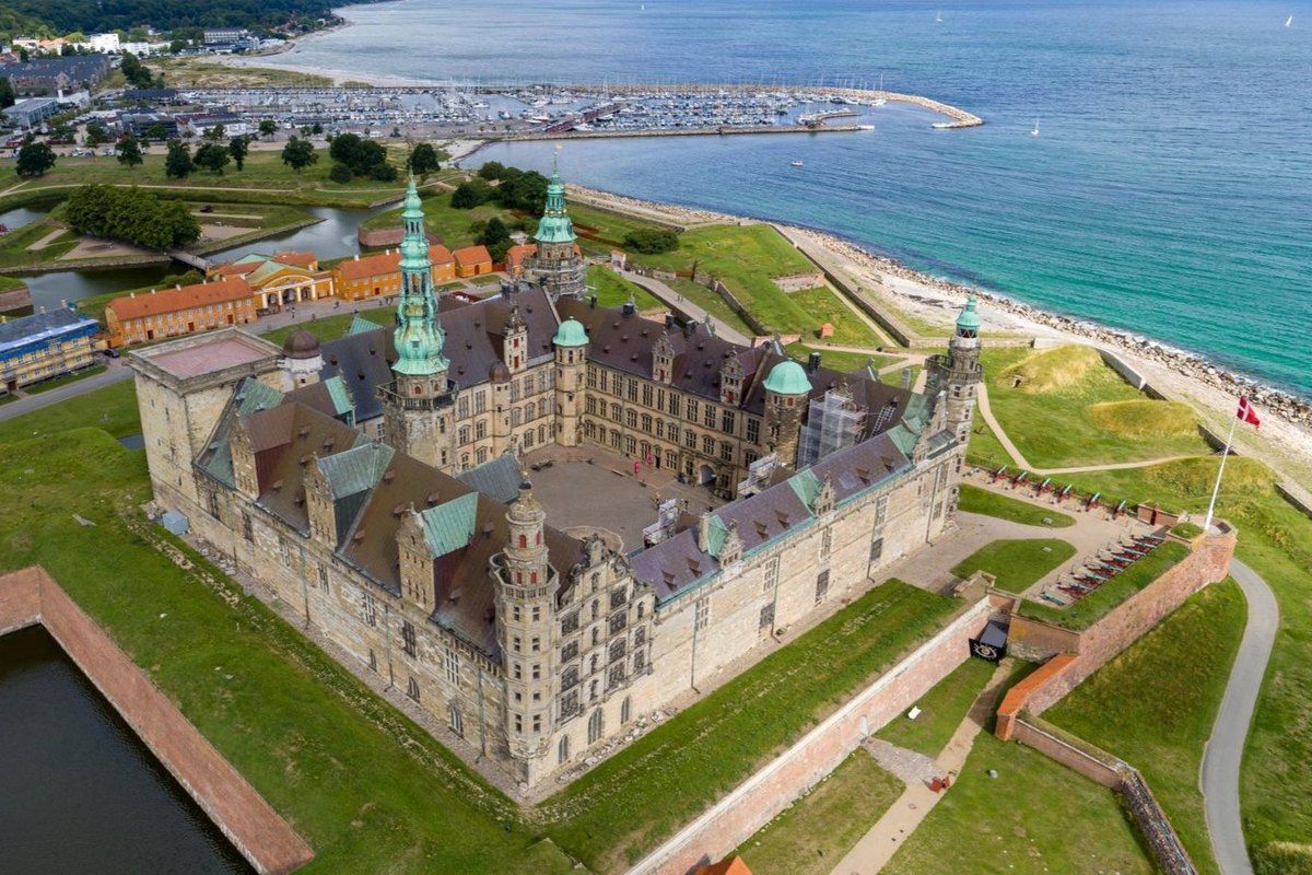 Aerial view of Kronborg Castle on its star-shaped bastions at Helsingør, with the Øresund behind