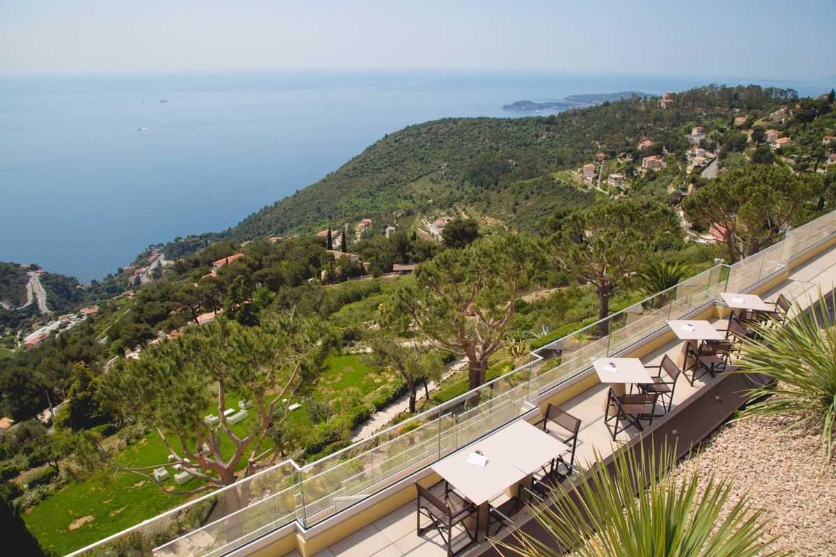 The terrace of Le Tillac at Les Terrasses d'Èze, looking out over the Mediterranean