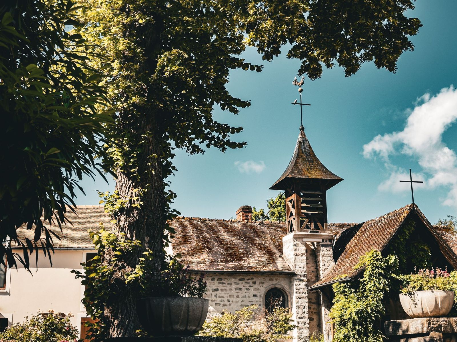 A small chapel and old houses in Barbizon, on the edge of the forest