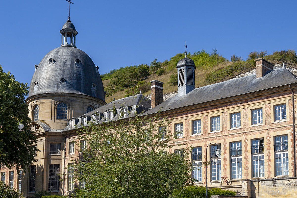 The domed Hôpital Saint-Jacques at Les Andelys below the chalk cliffs