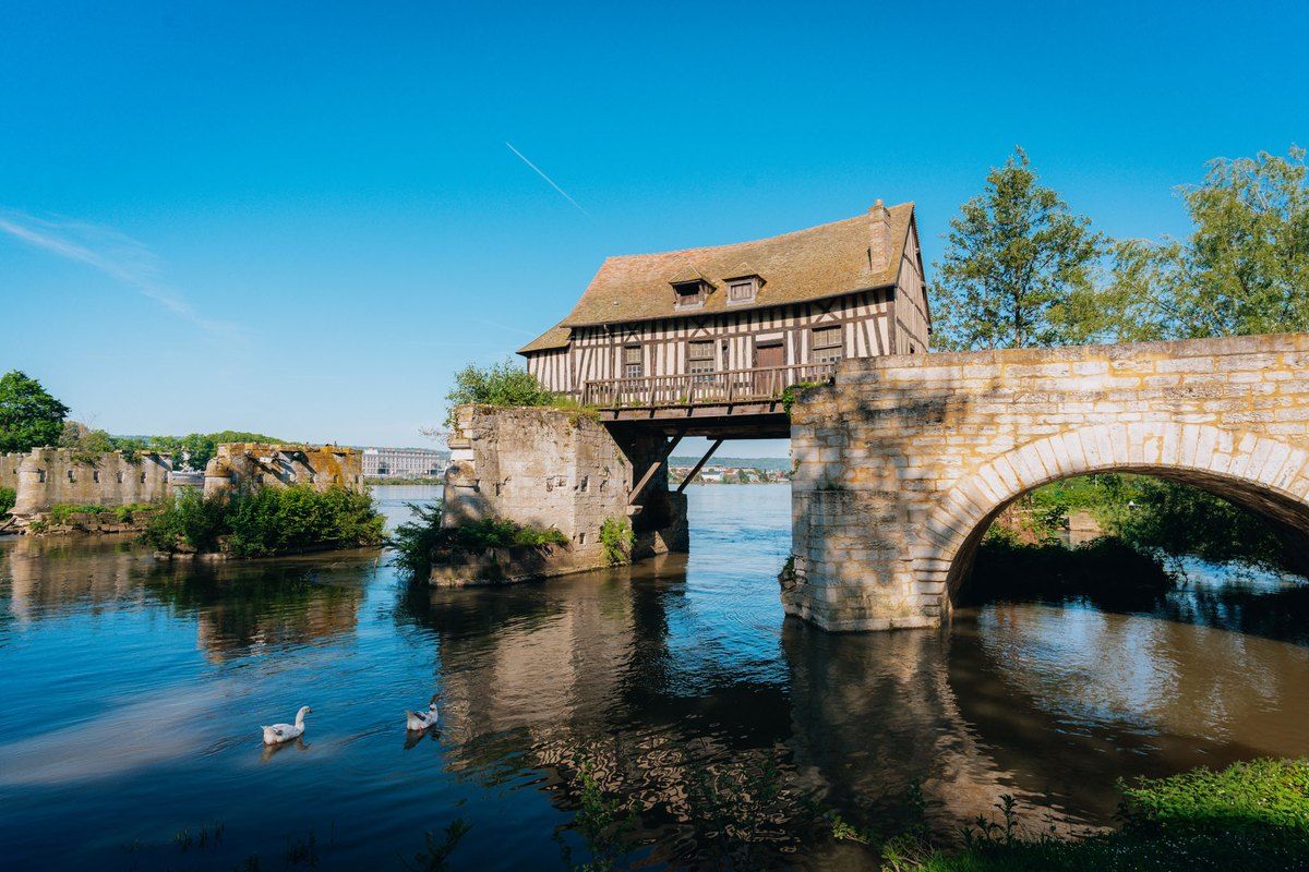 The half-timbered Vieux-Moulin of Vernon perched on the piers of the old bridge over the Seine