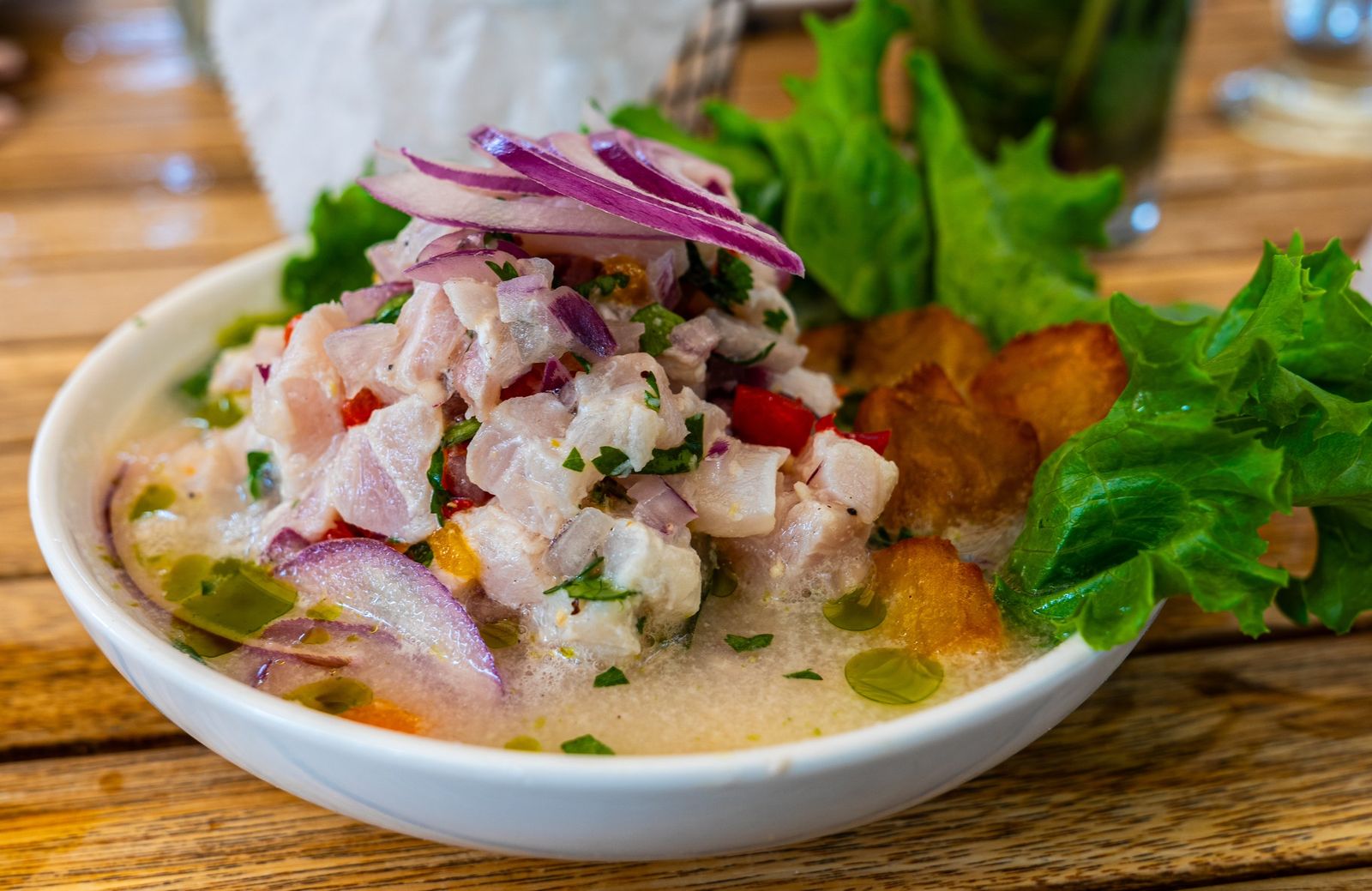 A Cuban-style ceviche on an outdoor table in Miami