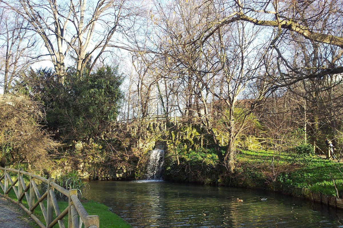 The small waterfall and pond in the English garden of the Villa Reale (Villa Belgiojoso Bonaparte), Milan