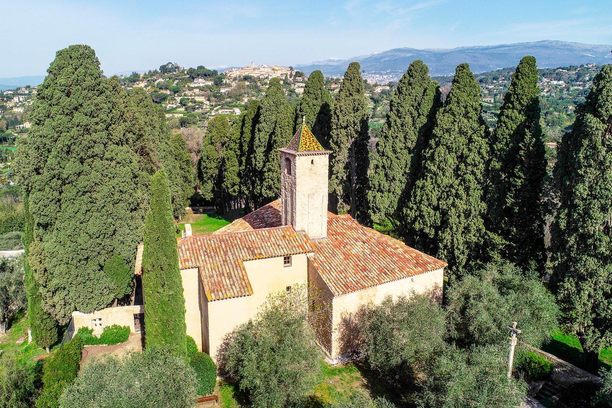 Aerial view of the chapel of Notre-Dame-de-Vie among cypresses on its hill above Mougins