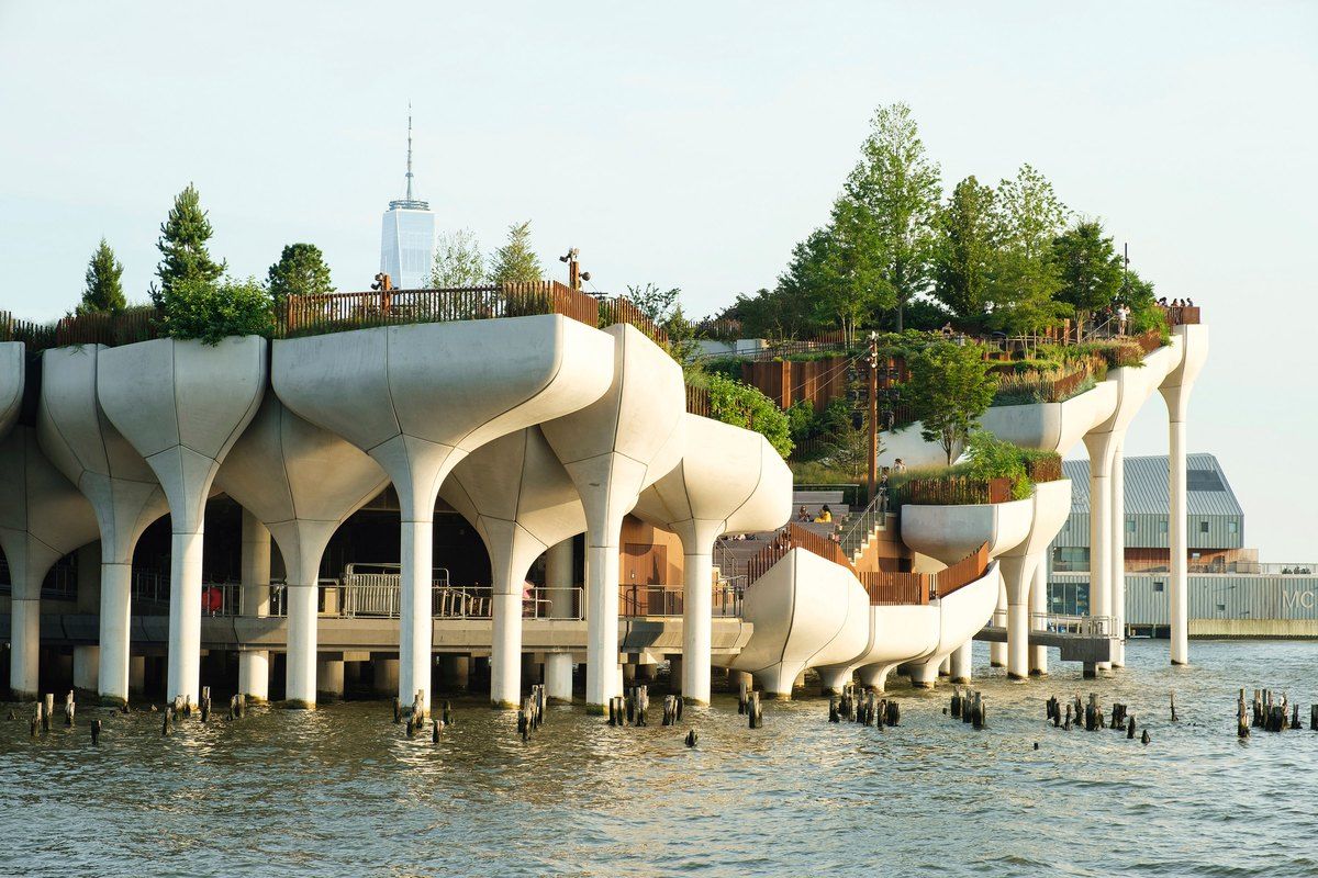 Little Island's tulip-shaped concrete piles and gardens rising out of the Hudson River