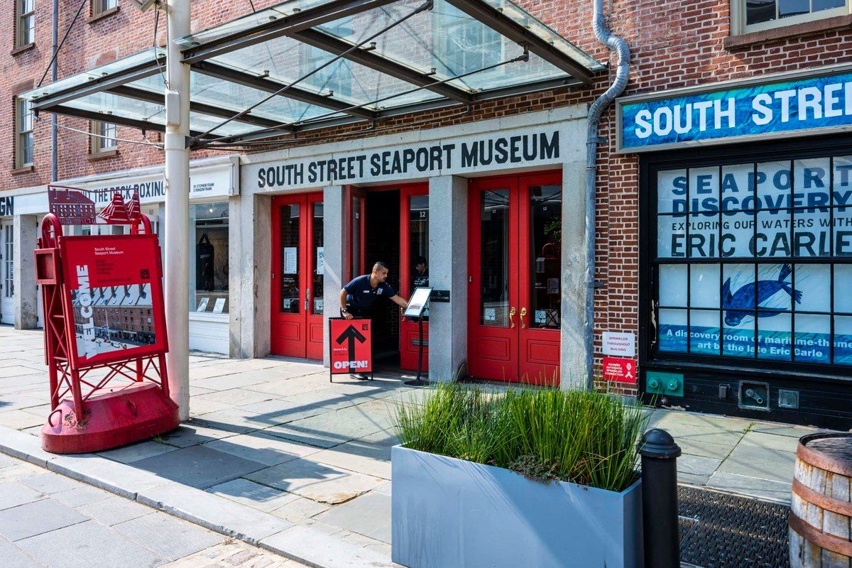 The entrance of the South Street Seaport Museum on Water Street
