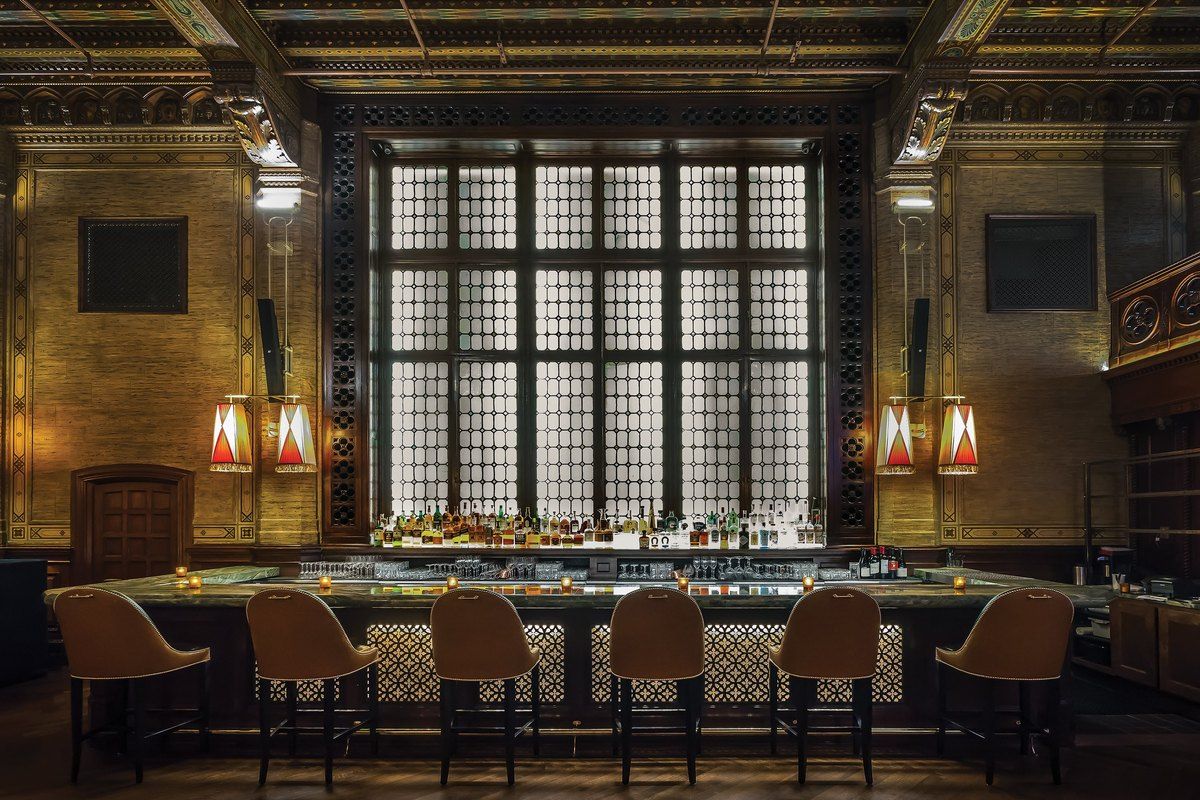 The leaded window and long bar of The Campbell in Grand Central Terminal