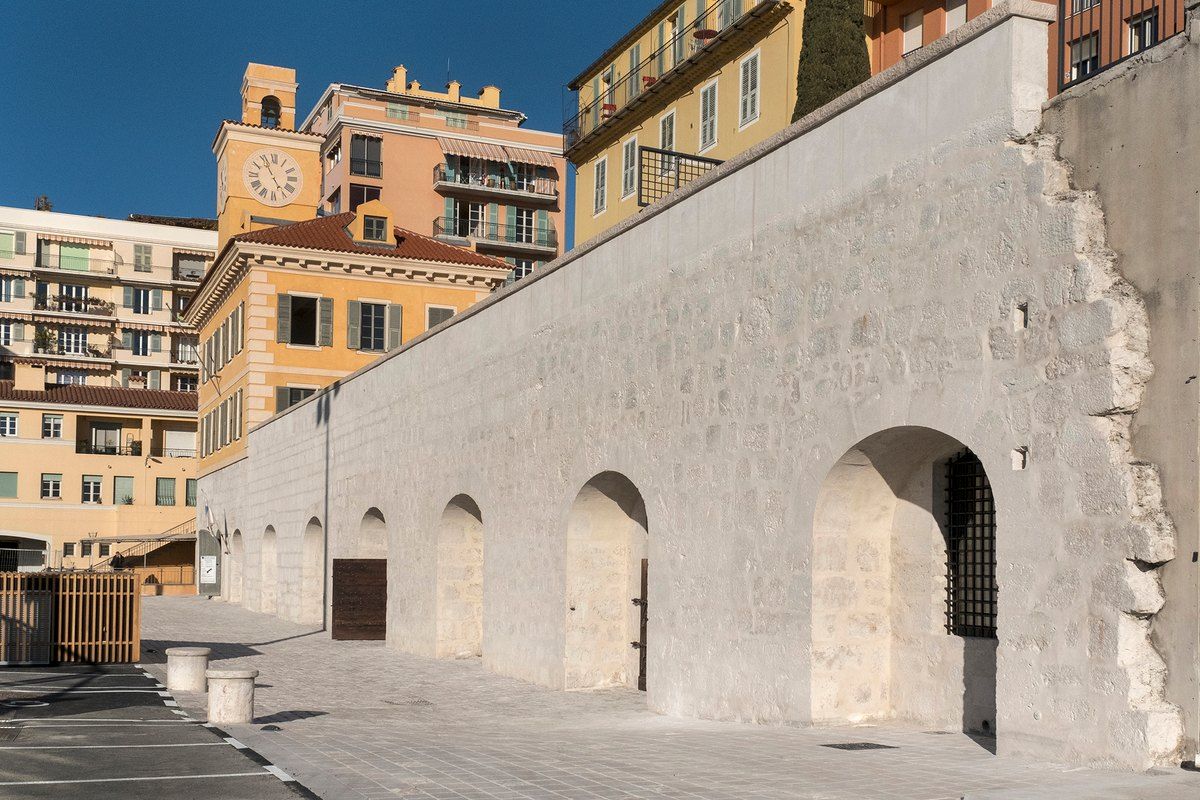 The stone walls of the Espace culturel départemental Lympia above the port of Nice