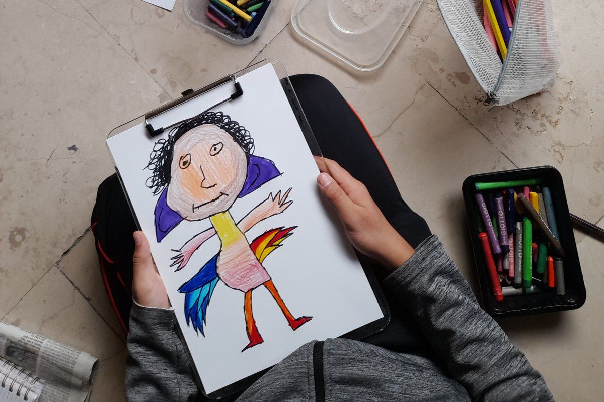 A child's drawing and crayons during a family visit at the Musée national Marc Chagall, Nice