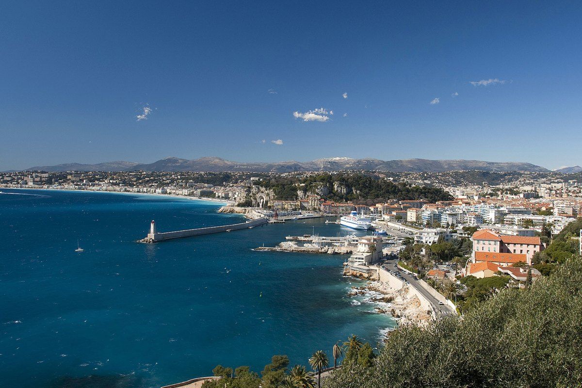 View from Mont Boron over the port of Nice, its lighthouse and the curve of the Baie des Anges