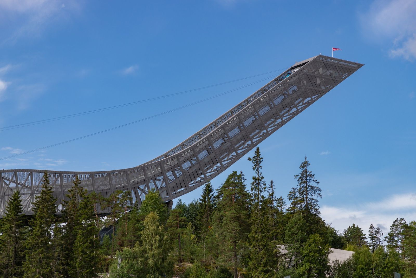 The Holmenkollen ski jump above the forest in Oslo