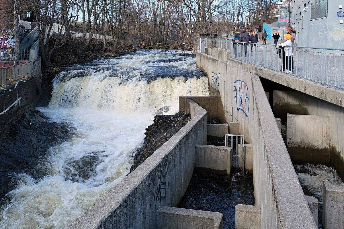 The Nedre Foss waterfall on the Akerselva river beside the fish ladder and the riverside path in Oslo
