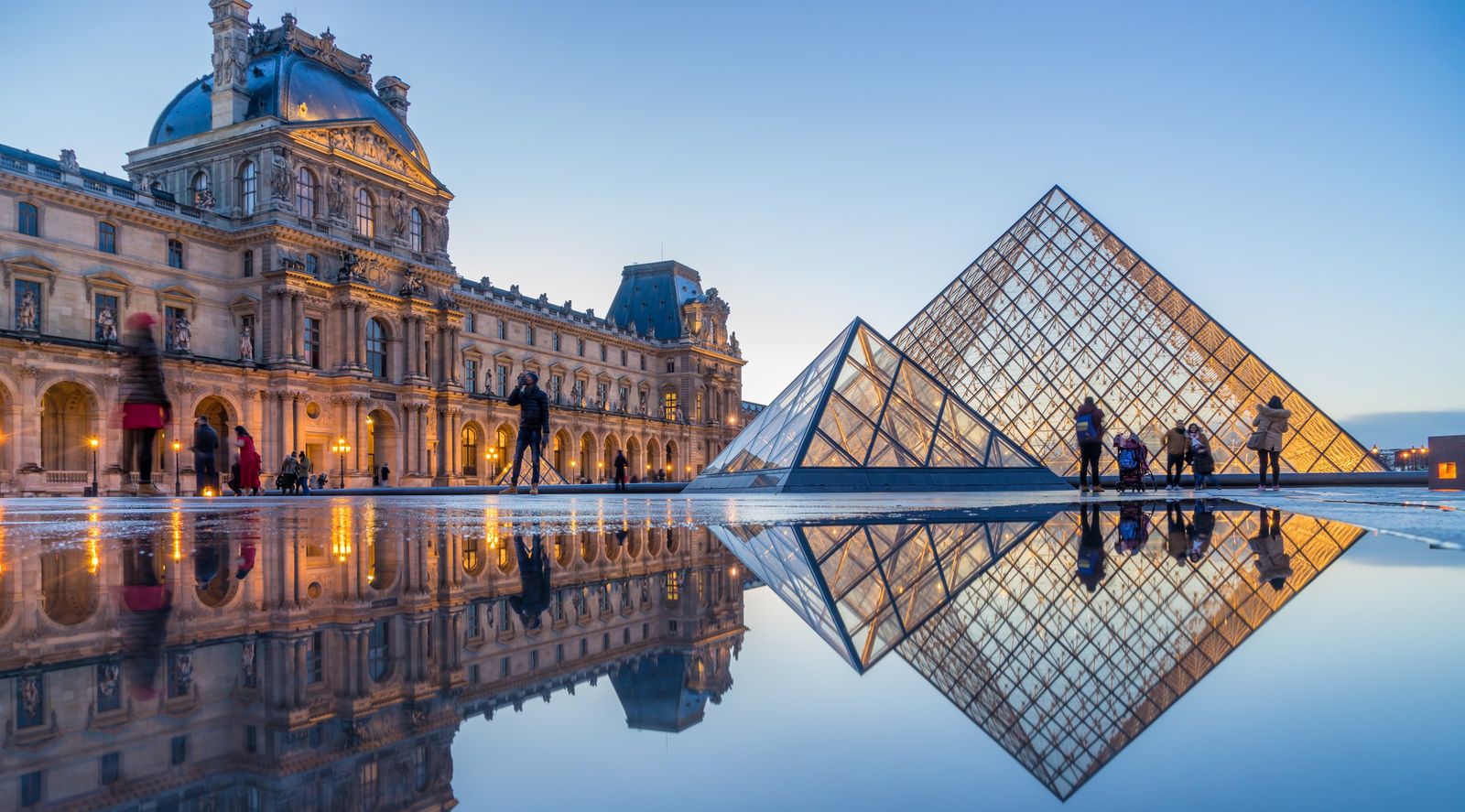 The Louvre and its glass pyramid in the evening light