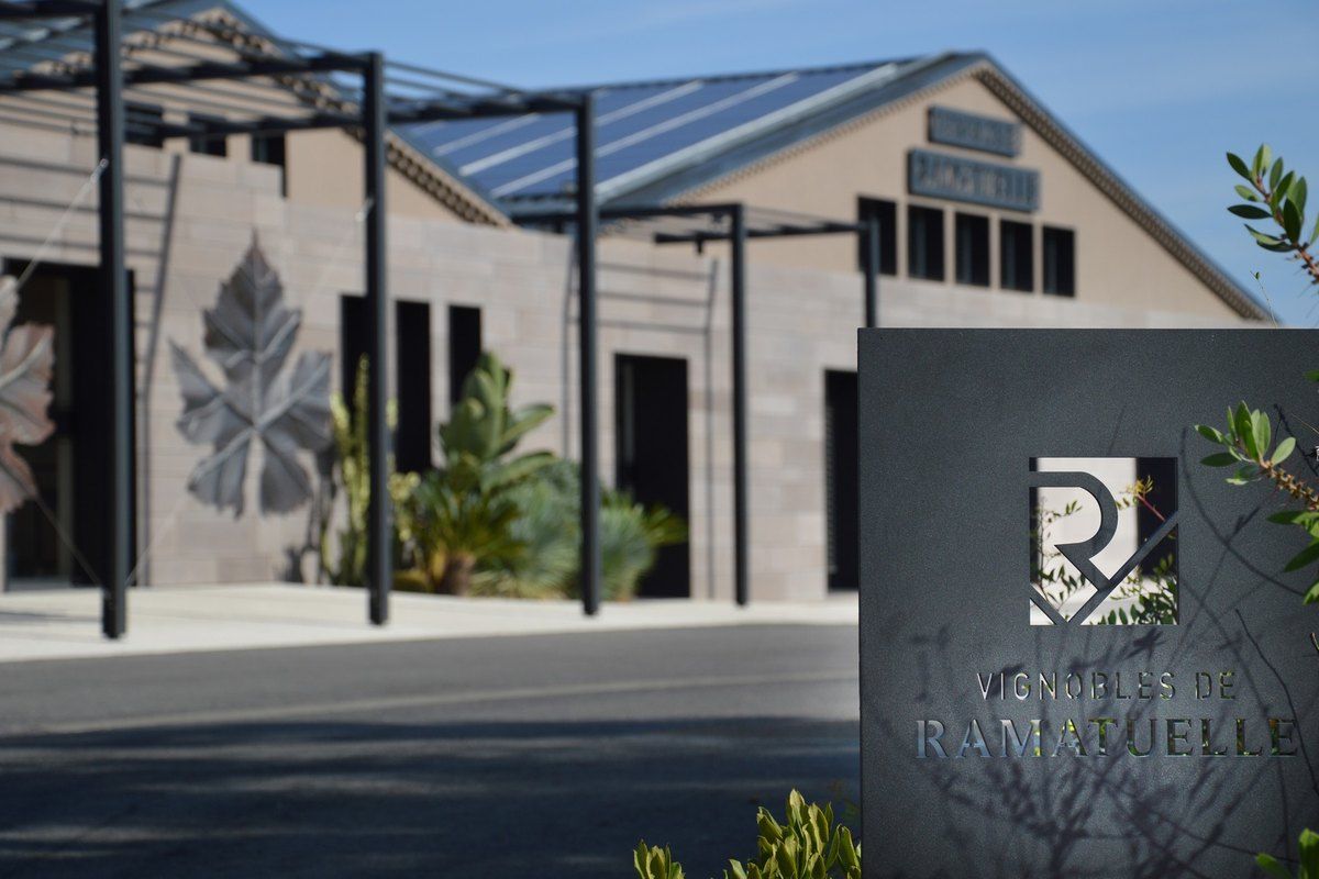 The modern cellar building of the Vignobles de Ramatuelle with its vine-leaf motif