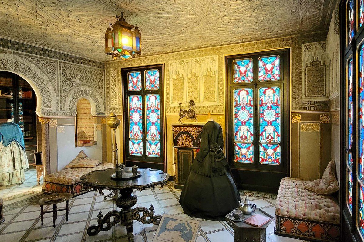 The Moorish salon of Alexandre Dumas's Château de Monte-Cristo, with carved plaster walls and stained-glass windows