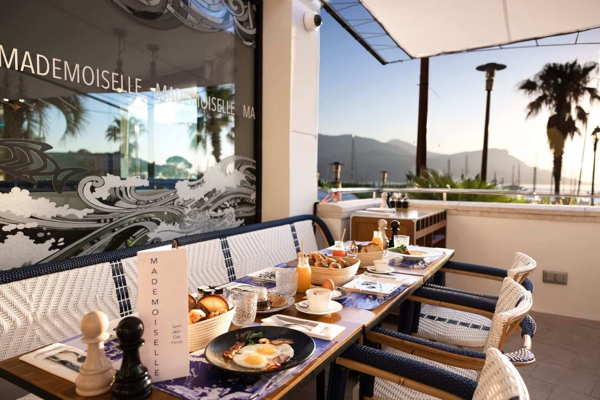The terrace of Mademoiselle by the port of Saint-Jean-Cap-Ferrat