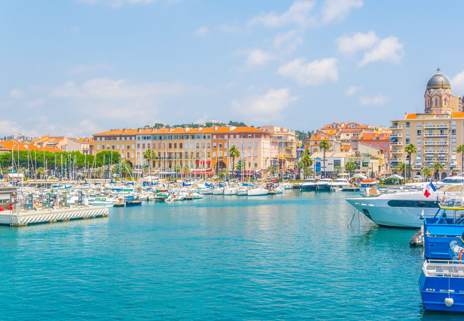 The marina of Saint-Raphaël below the Basilica of Notre-Dame de la Victoire