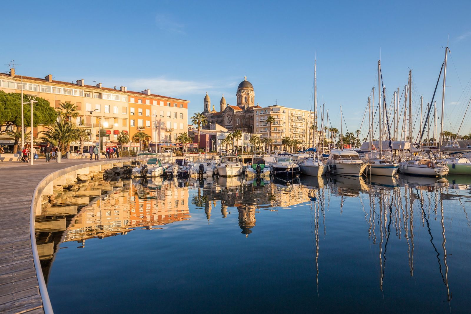 The old port of Saint-Raphaël and the Basilica of Notre-Dame de la Victoire