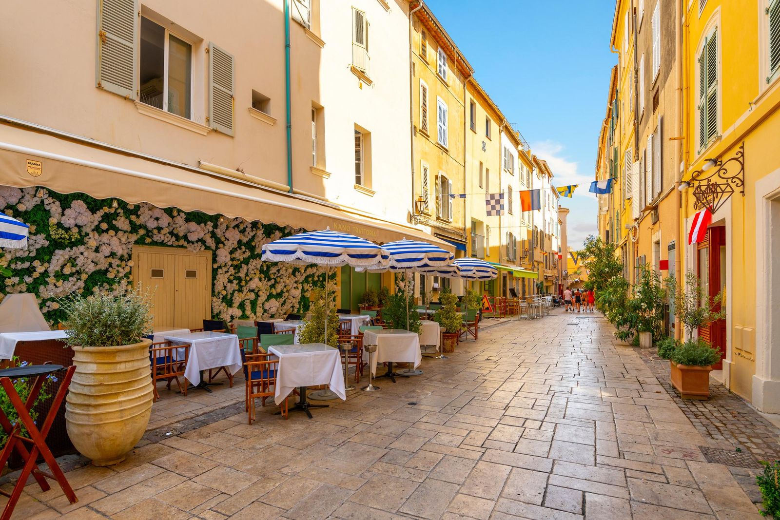 An alley of shops and cafés in the old town of Saint-Tropez