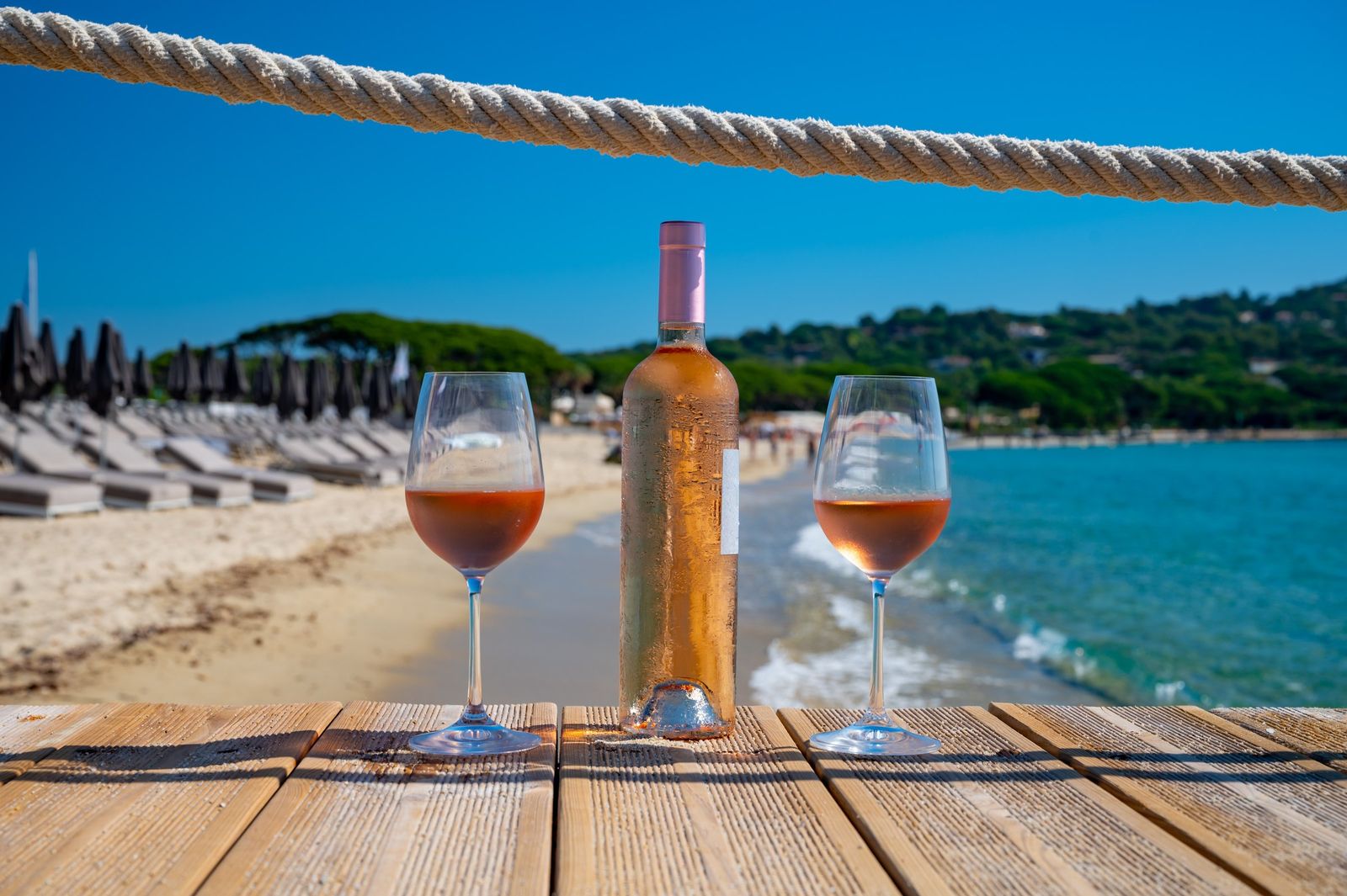Chilled Provence rosé on a wooden pier by the Plage de Pampelonne