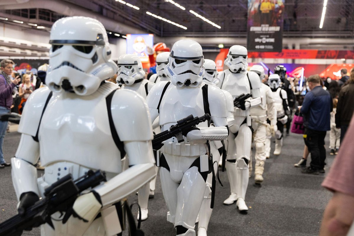 A troop of costumed stormtroopers marching through the hall at Comic Con Stockholm, Stockholmsmässan