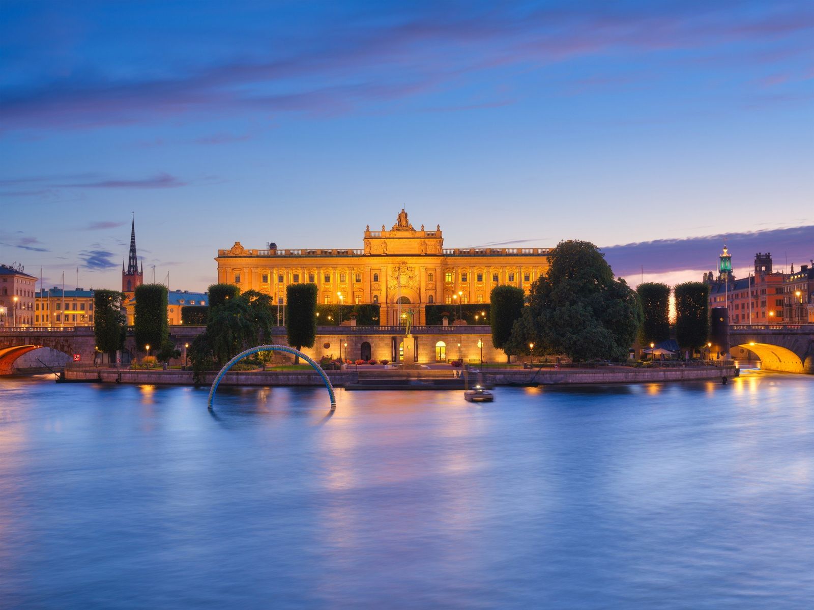The Royal Palace and the old town of Stockholm across the water at dusk