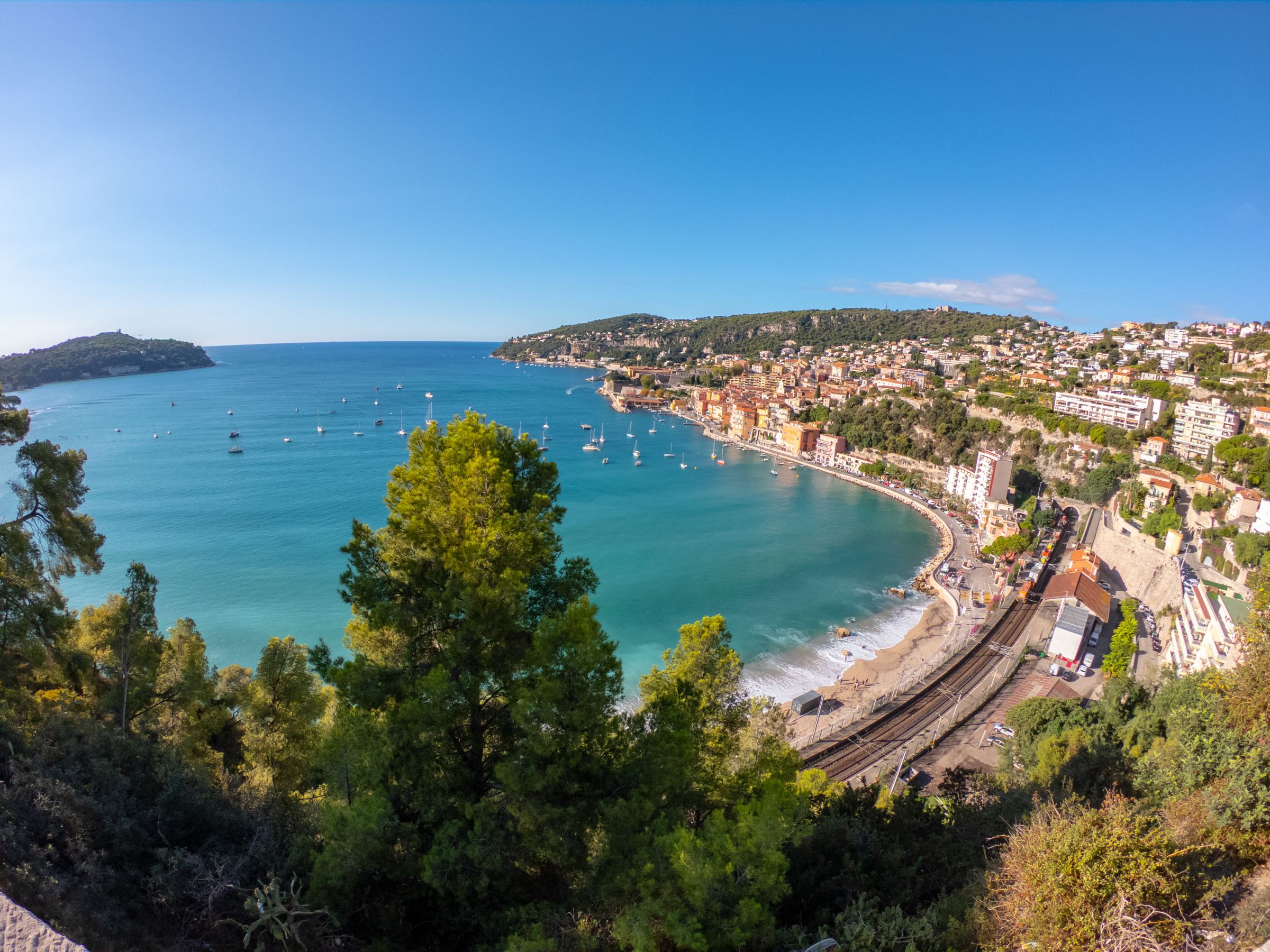 The bay of Villefranche-sur-Mer seen through the pines on the hillside