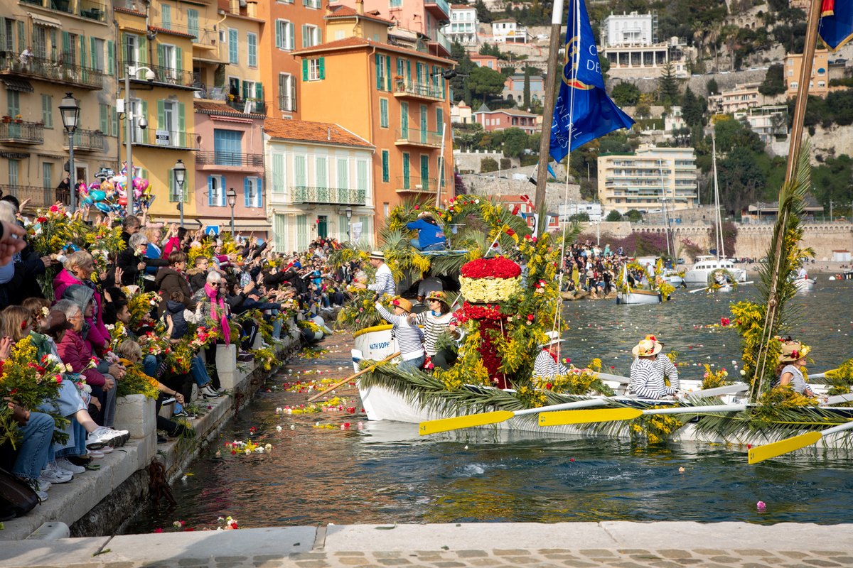 Flower-decked pointus boats at the Combat Naval Fleuri, Villefranche-sur-Mer