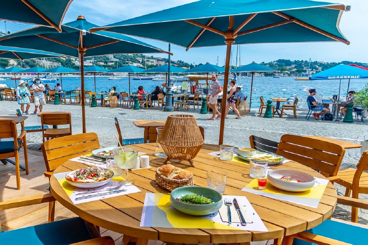 The seafront terrace of Dry Restaurant and Cocktail Bar on quai de l'Amiral Courbet, Villefranche-sur-Mer