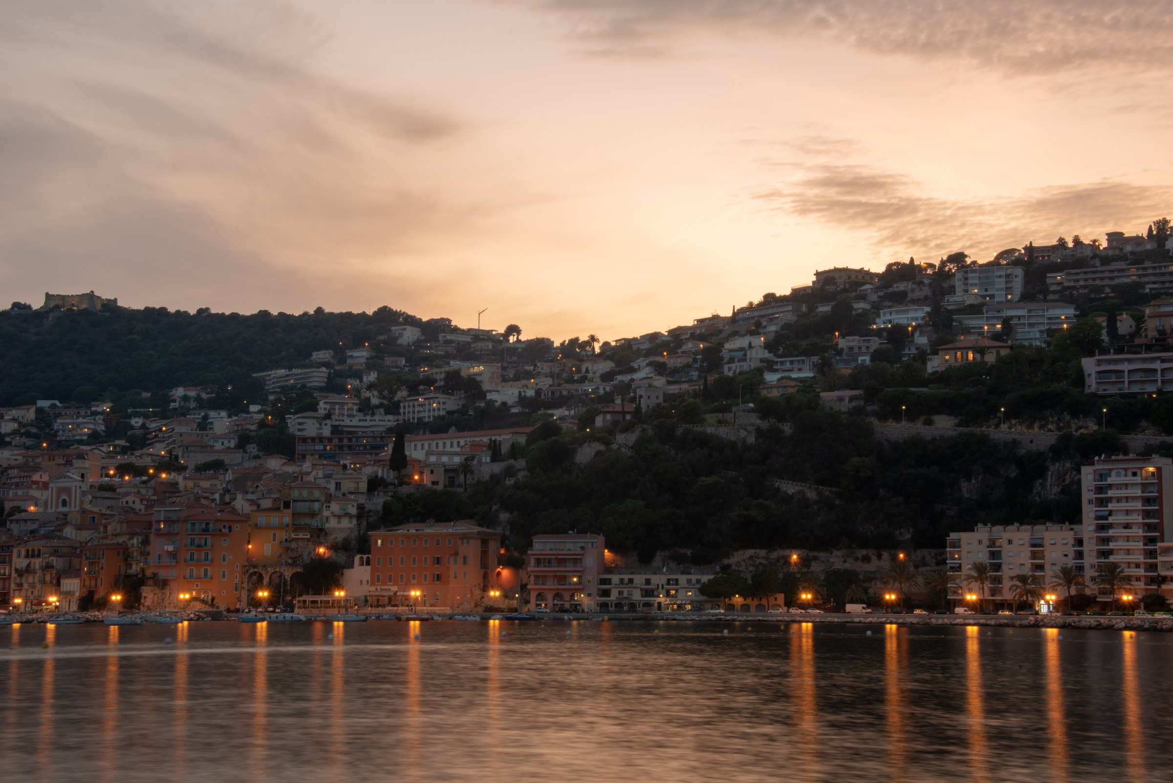 Lights reflected in the bay of Villefranche-sur-Mer at sunset