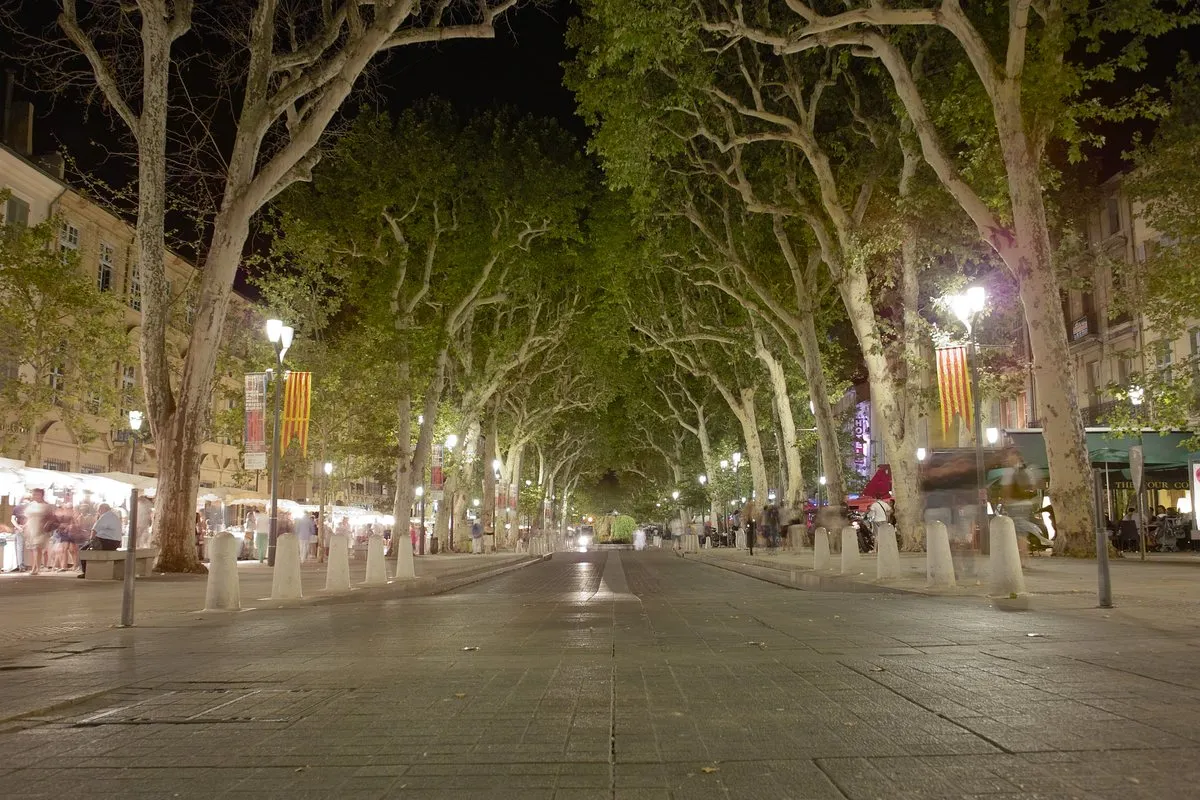 Cours Mirabeau in Aix-en-Provence beneath its plane trees in the evening