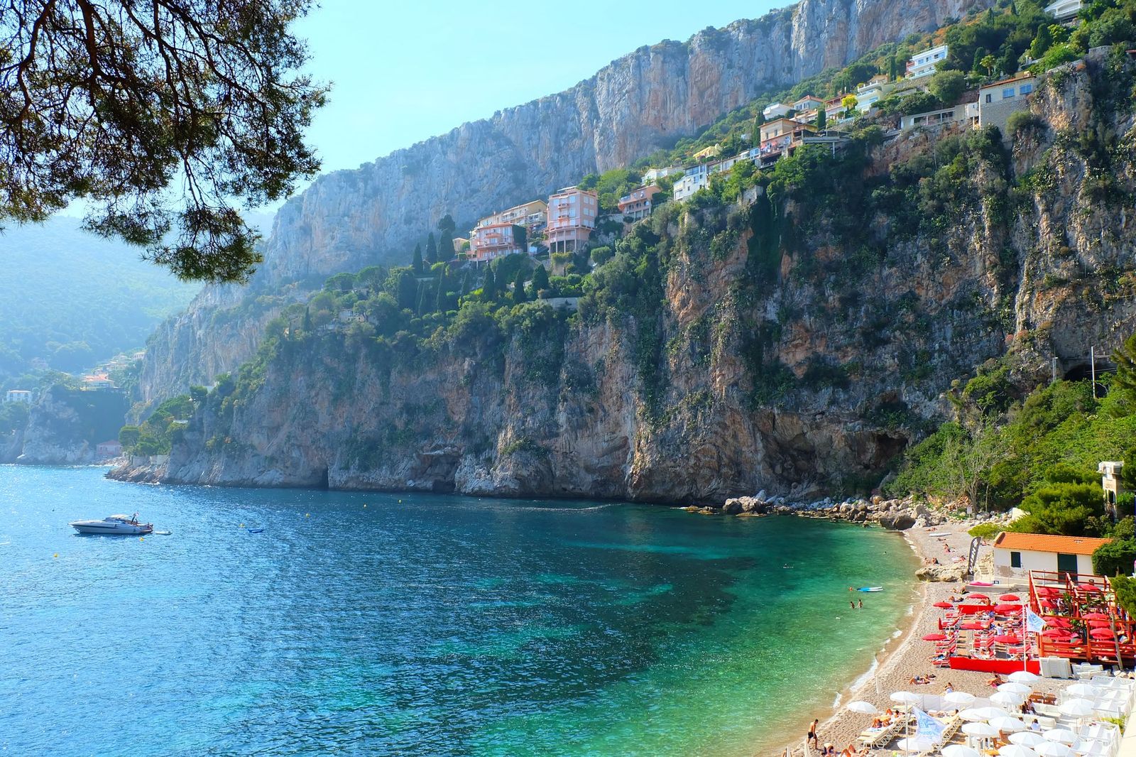 Plage Mala at Cap d'Ail: turquoise water in a cove below the limestone cliffs