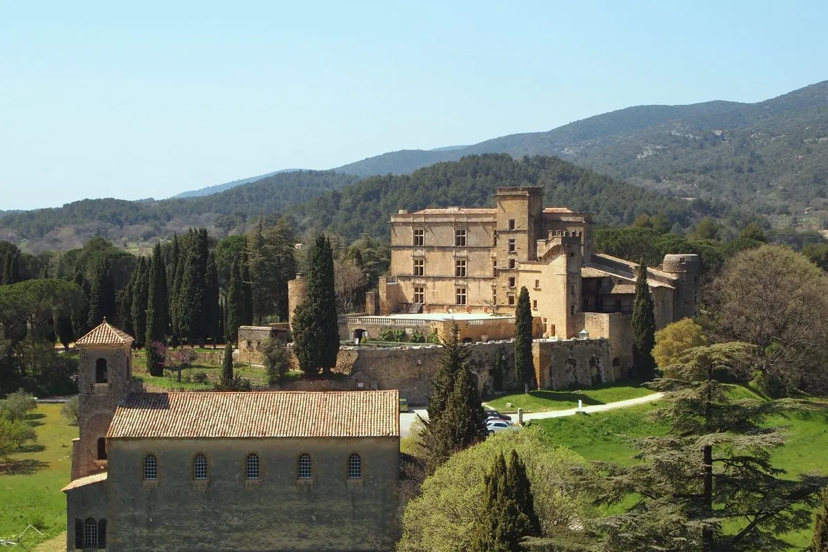 Château de Lourmarin among cypresses and pines in the Luberon