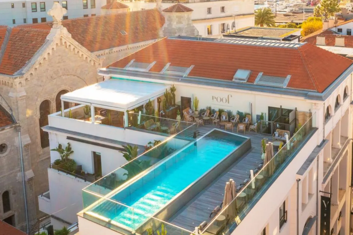 Aerial view of Five Seas hotel rooftop pool and Roof bar terrace