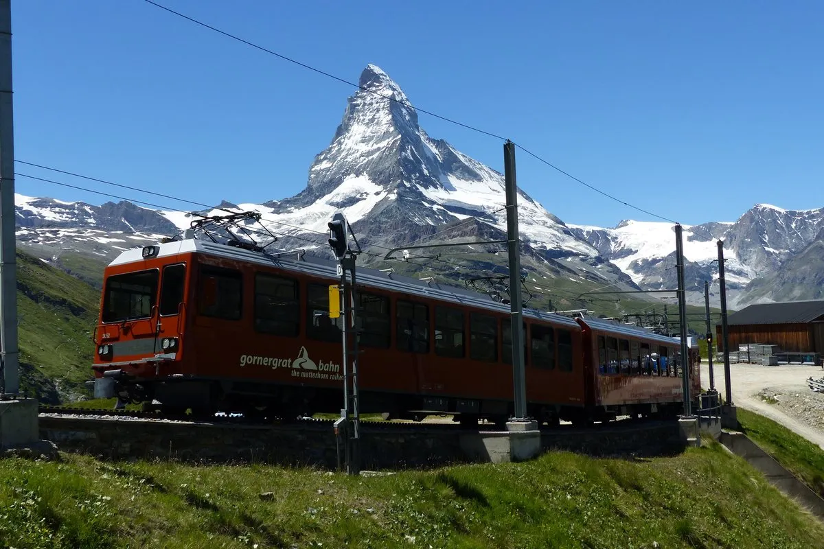A Gornergrat Railway train with the Matterhorn behind, above Zermatt