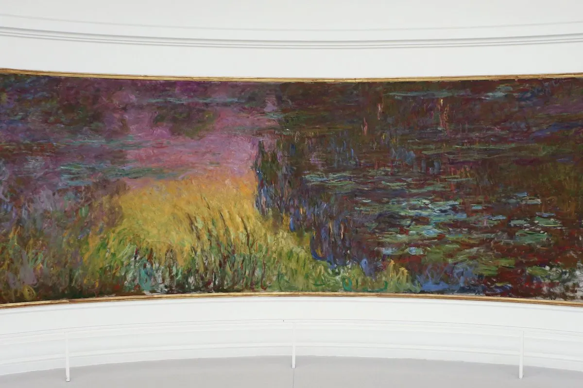 Monet's Water Lilies on the curved wall in one of the oval rooms at the Musée de l'Orangerie in Paris