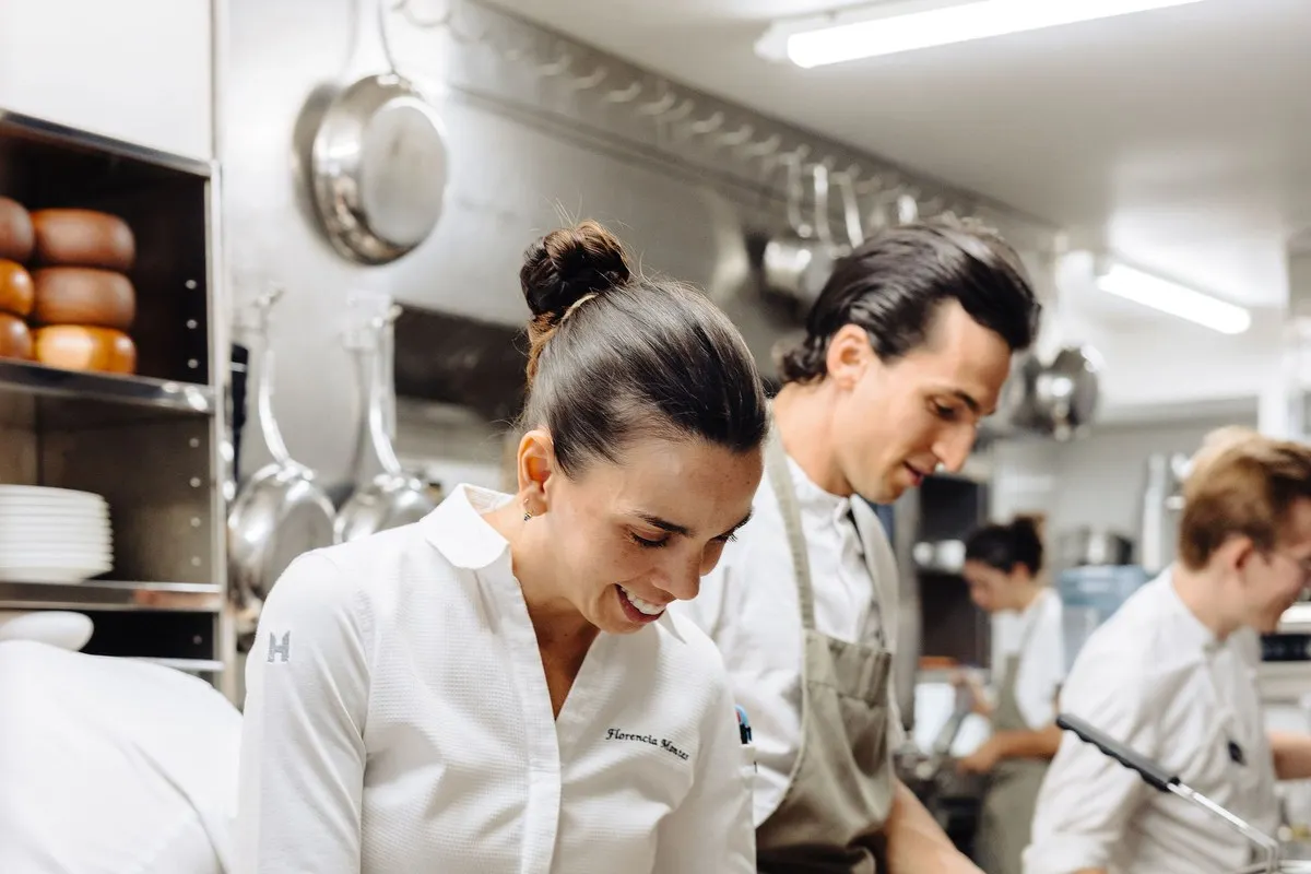 Chefs Florencia Montes and Lorenzo Ragni at work in the kitchen of ONICE in Nice