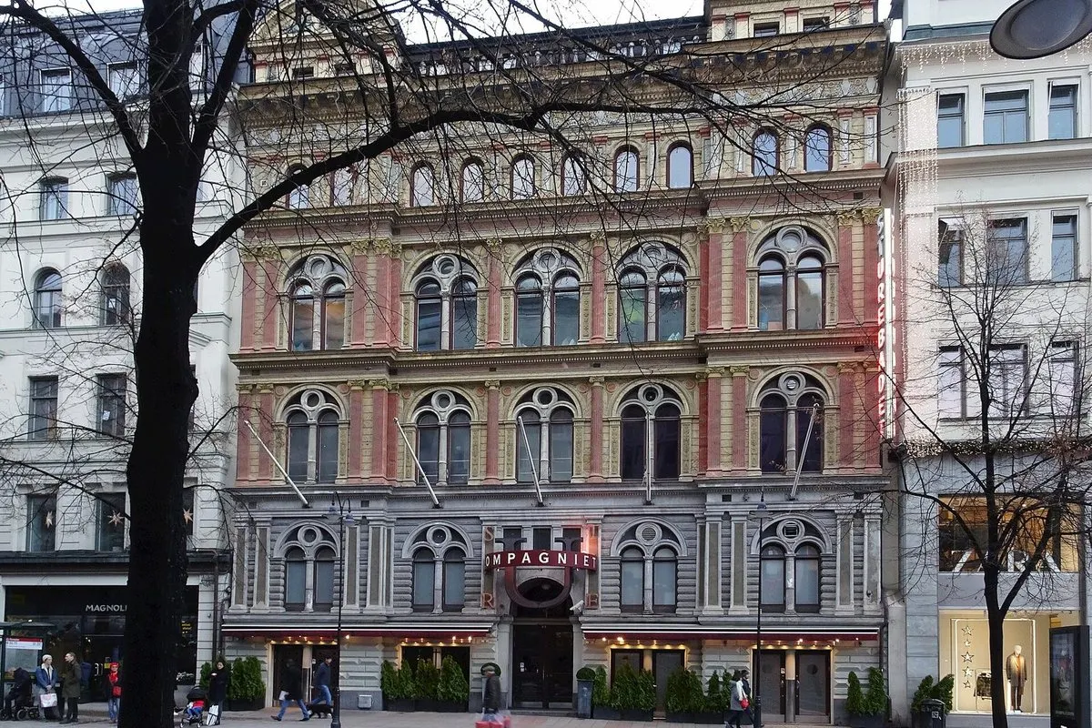 Sturebadet's Venetian-inspired façade in red marbling at Sturegatan 4 by Stureplan in Stockholm