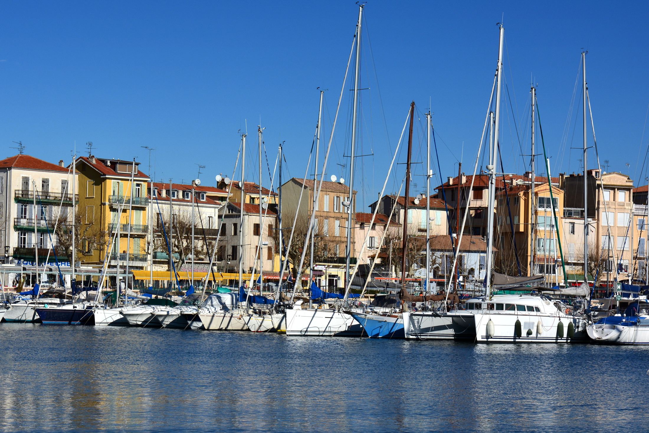 Colourful houses and boats in the harbour of Golfe-Juan, Vallauris