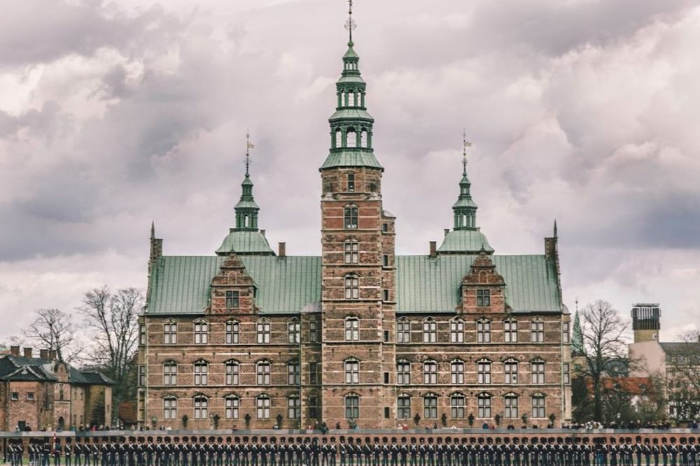 The Renaissance façade and copper spires of Rosenborg Castle seen across its moat
