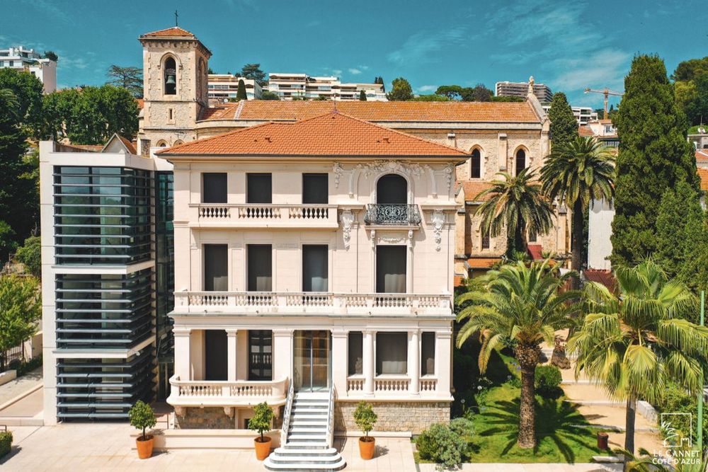 The 1908 Belle Époque building of the Musée Bonnard among palms in Le Cannet