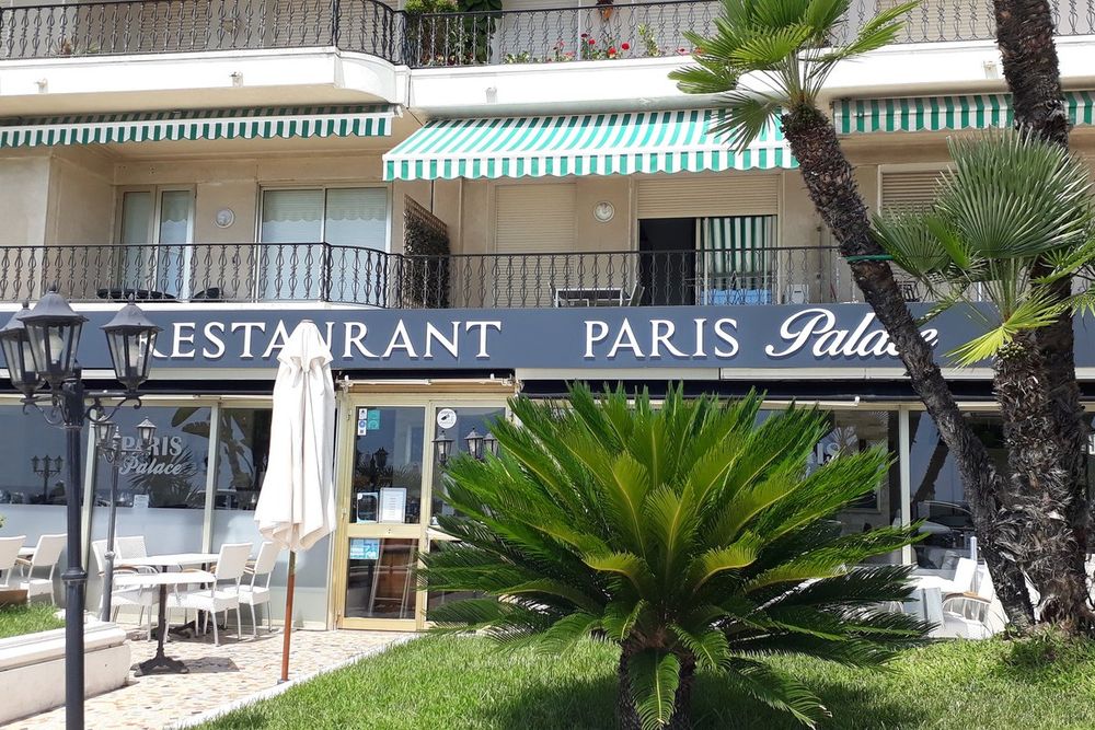 The entrance and garden of the Paris Palace restaurant on the Promenade du Soleil, Menton