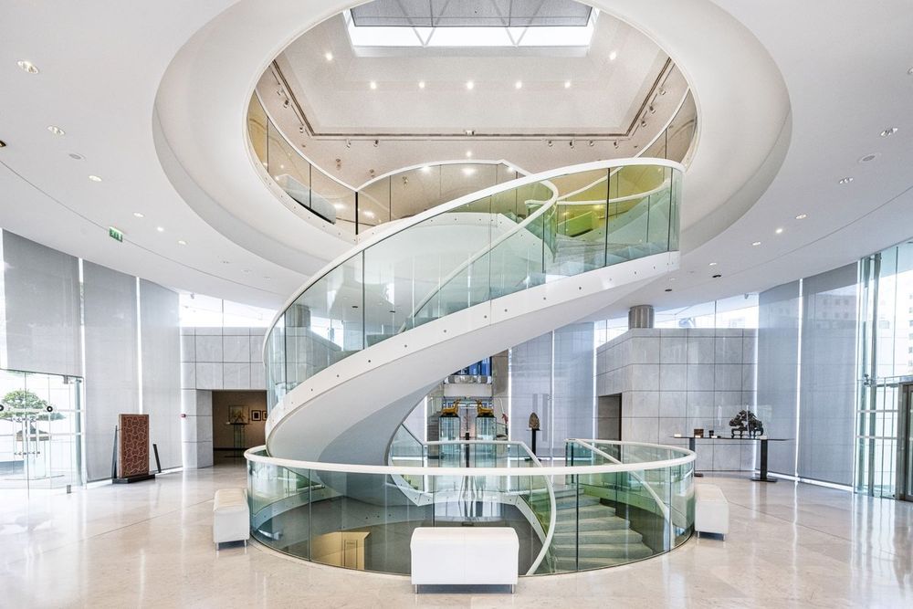 The white spiral staircase under the glass roof of the Musée départemental des Arts Asiatiques, Nice