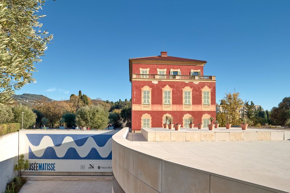 The red Genoese villa of the Musée Matisse among the olive trees of Cimiez