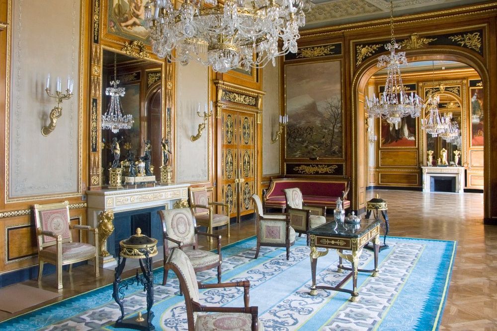 A gilded Belle Époque salon with chandeliers inside the Villa Masséna, Nice