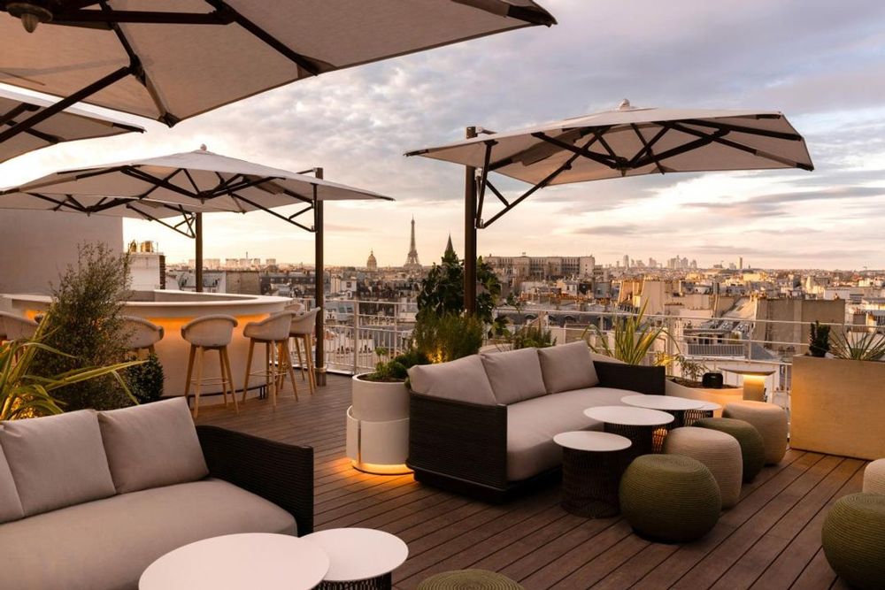 The rooftop bar of the Hôtel Dame des Arts looking towards the Eiffel Tower