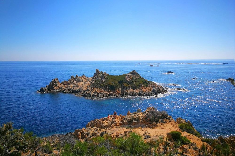 The rocky islet of the Rocher des Portes off Cap Camarat in a deep blue sea